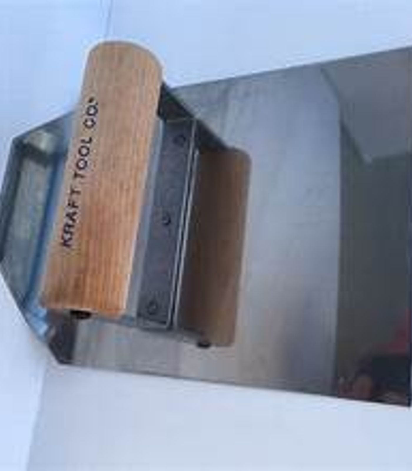 Cove trowel SS, 7" X 6" x 1" radius, 45 degree cut